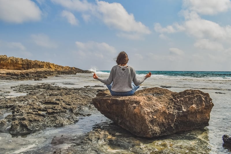 Woman practicing yoga and meditation